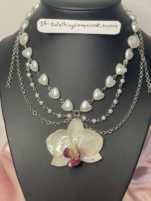 natural orchid color with simulated heart pearl