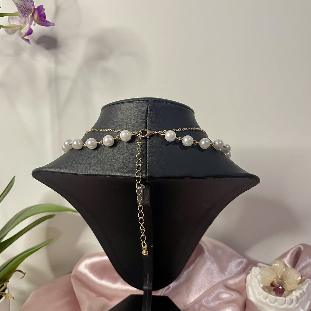 pink real orchid with pink lily of the valley fairy 🧚‍♂️