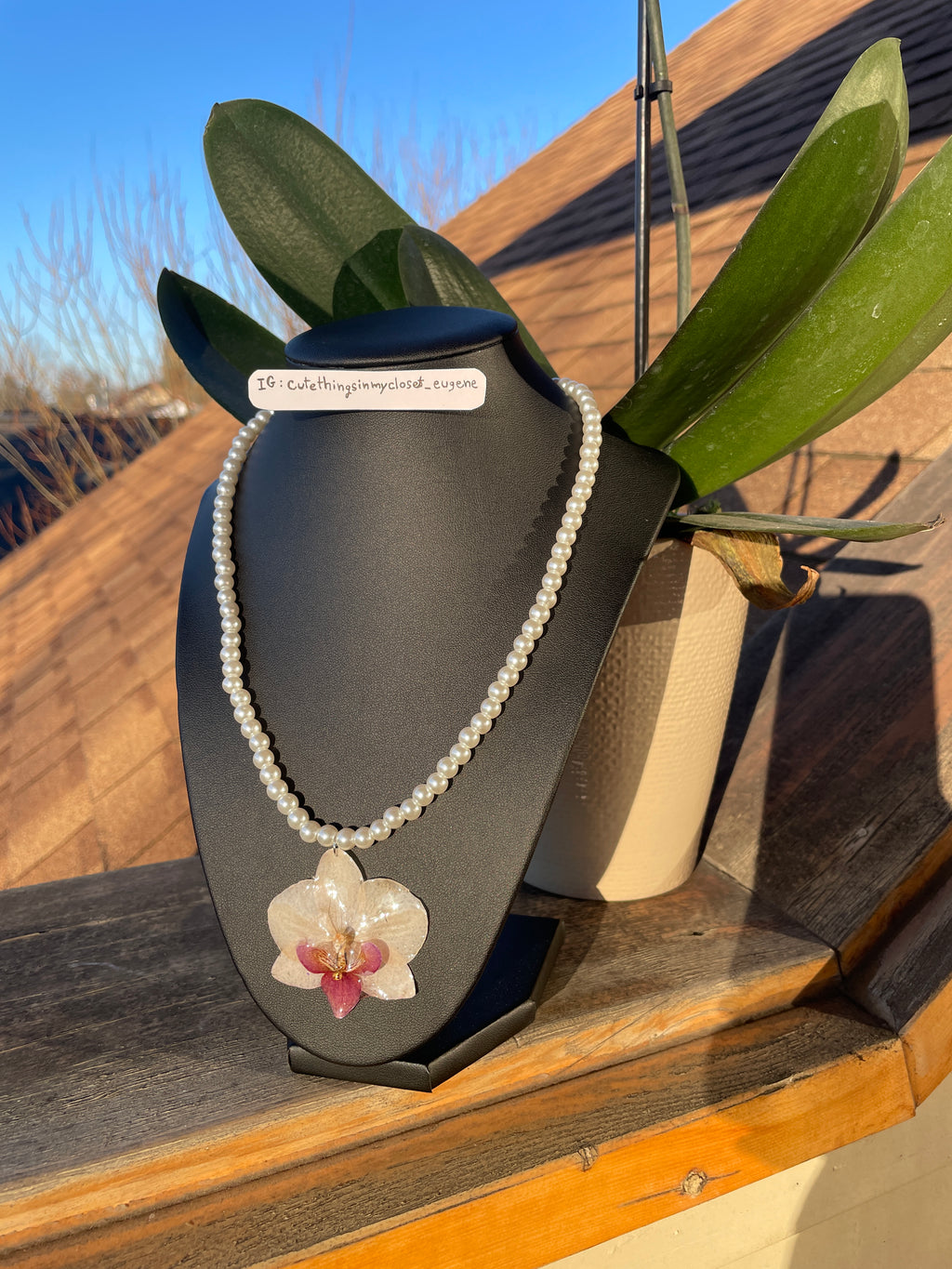 natural color orchid with simulated white pearl